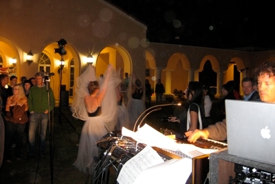 R. L. Silver on synthesizer, with Fuzión dancers