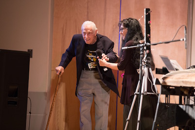 Masaoka with audience member Bernard Friedland